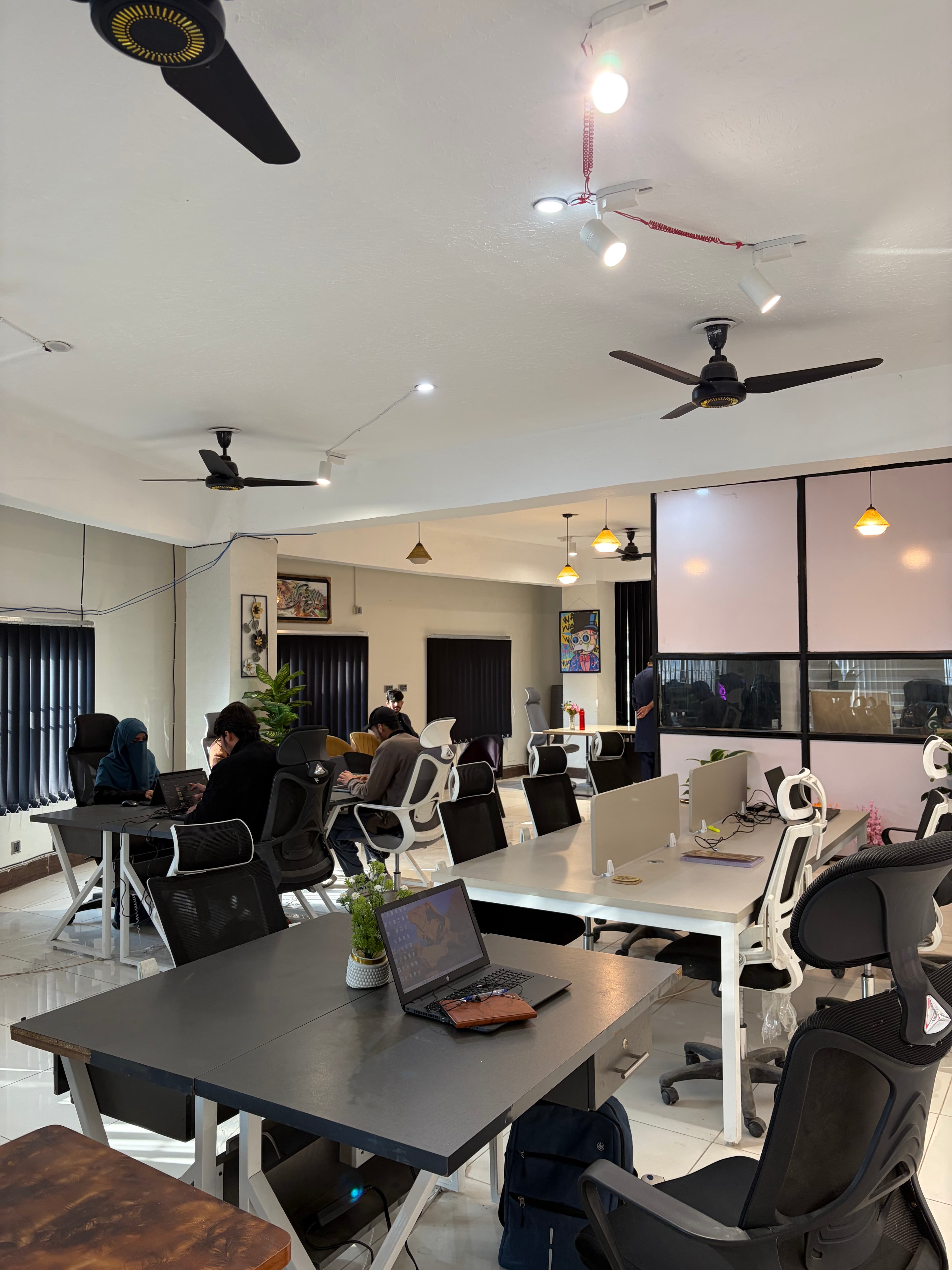 Modern workspace with desk and laptop